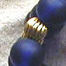 blue glass beads on memory wire bracelet