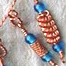 knitted and wound copper wire necklace with glass bead accents