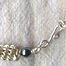 knitted and wound sterling silver necklace with hematite accents