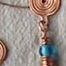 assorted glass bead and copper wire necklaces